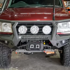 Toro Bull Bar Suitable for Toyota Landcruiser 105 Series Dress up your 105 with confidence and style with the Offroad Animal Toro Bull Bar, specially designed for the Toyota Landcruiser 105 Series. This robust and stylish bull bar not only enhances the rugged aesthetics of your vehicle but also provides unparalleled protection and functionality. Key Features: Ultimate Protection: Engineered with steel, the Toro Bull Bar offers superior protection against animal strikes and off-road obstacles, ensuring your Landcruiser 105 Series remains unscathed in the toughest terrains. Great approach angle Sleek Design: With its aggressive yet sleek design, the Toro Bull Bar seamlessly integrates with the Landcruiser 105 Series, enhancing its bold and adventurous look without compromising on functionality. The bar only sits 150mm out from the front of the grill. Winch Compatibility: Equipped as standard with a winch cradle, this bull bar allows you to mount a winch effortlessly through the front with out having to remove the bull bar, giving you the capability to tackle any recovery situation with ease, or just do maintenance on your winch. Light Mounting Options: Features multiple mounting points for auxiliary lights including an integrated spot for a 22